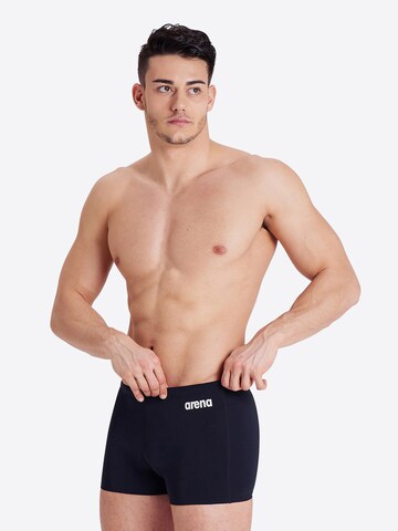 Pantaloncini da bagno 'TEAM SOLID' di ARENA in nero