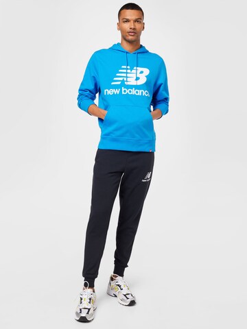 new balance Avsmalnet Bukse 'Essentials' i svart