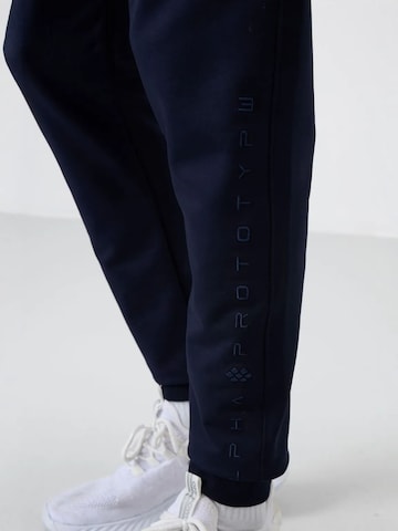 Tommy Life - Tapered Calças de desporto em azul