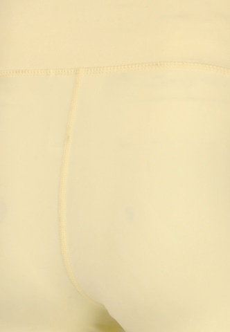 Athlecia Slim fit Sports trousers 'Blossom' in Yellow