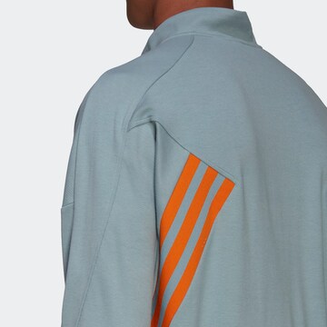 ADIDAS SPORTSWEAR - Camiseta deportiva en azul