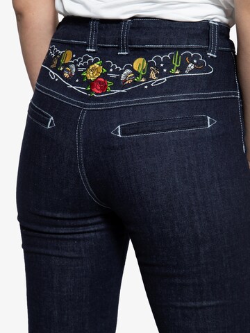 Queen Kerosin Slimfit Jeans‌‌‌‌‌‌‌‌‌‌ in Blau