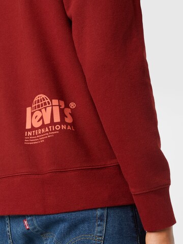 LEVI'S ® - Sweatshirt 'Relaxd Graphic Crew' em vermelho
