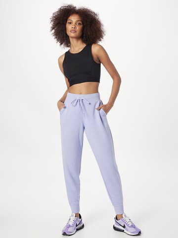 SKECHERS Tapered Sportbroek in Lila