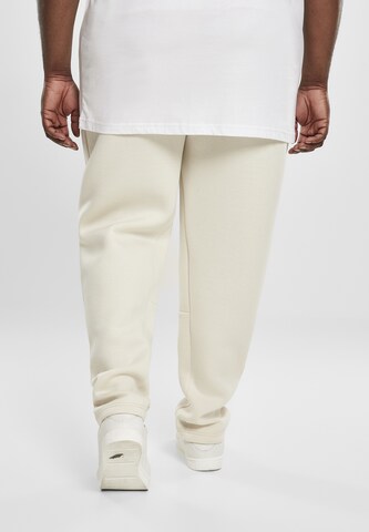 Regular Pantalon 'Cut and Sew' Urban Classics en beige