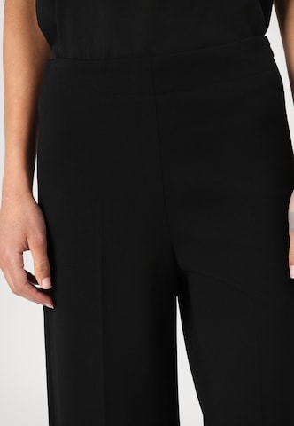 DRYKORN Wide Leg Suorat housut 'BEFORE' värissä musta