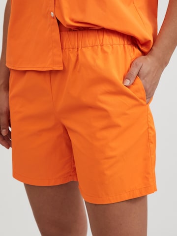 VILA Regular Pleat-Front Pants 'Katan' in Orange