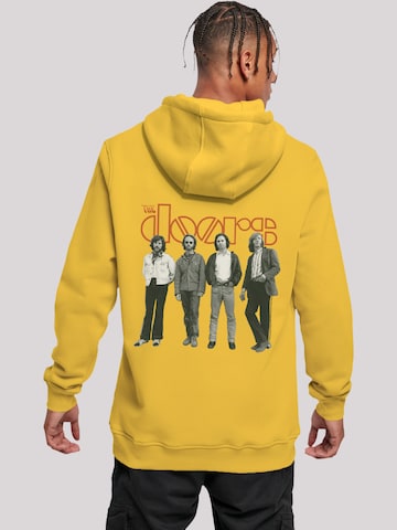 F4NT4STIC Sweatshirt 'The Doors Music Band Band Standing' in Geel: voorkant