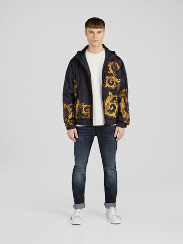 QS - Sudadera en gris