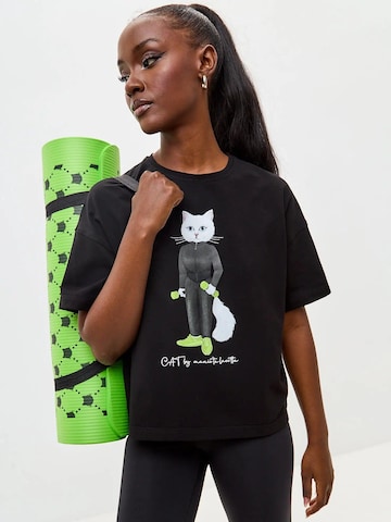 T-shirt 'Sport Cat with Dumbbells' Cat e Lolette en noir