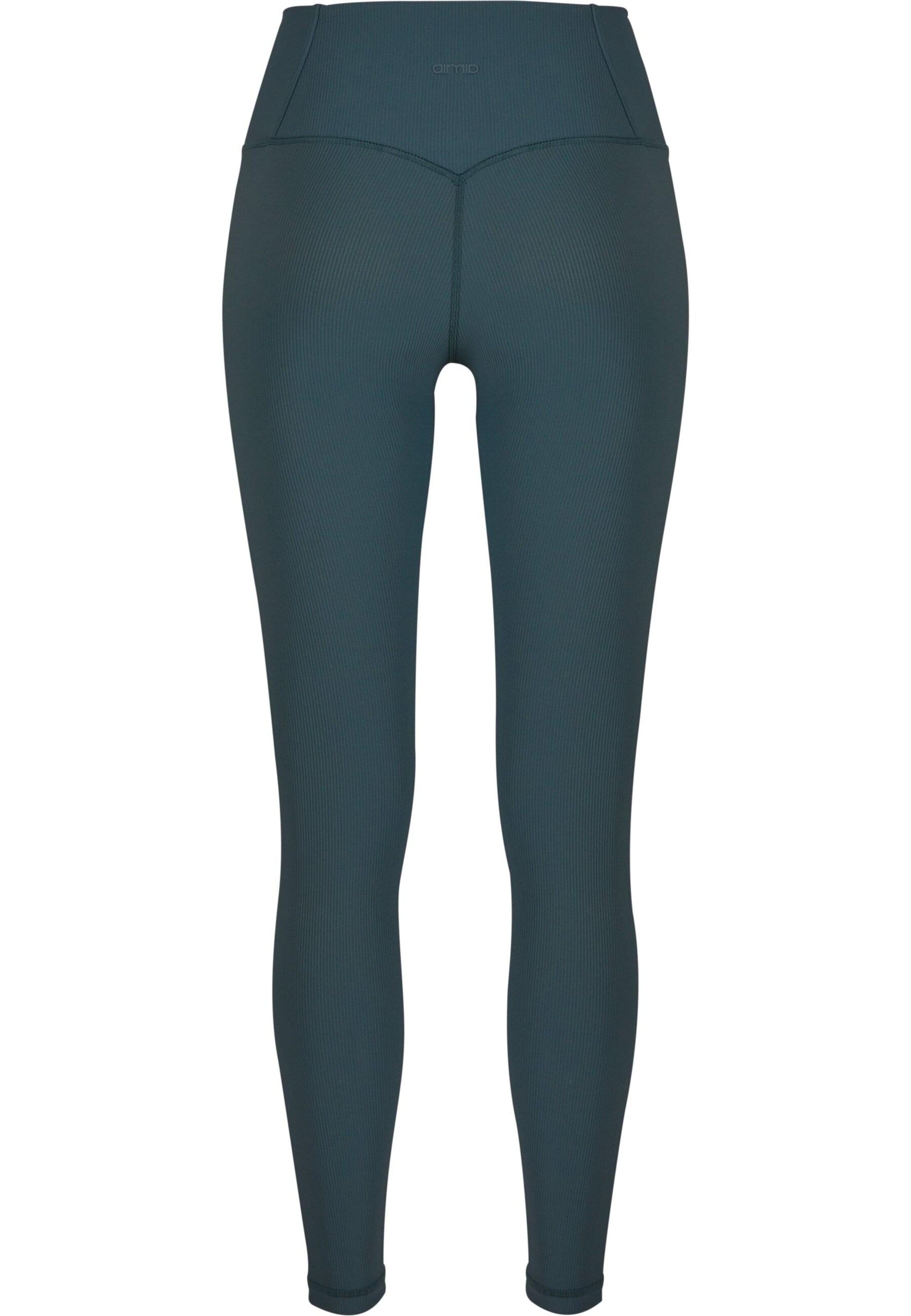 Skinny Pantaloni sportivi di Aim'n in verde