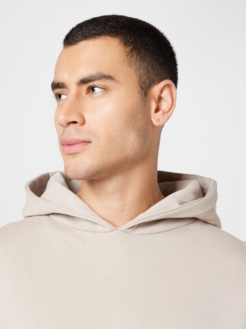 Kosta Williams x About You Hoodie in Beige