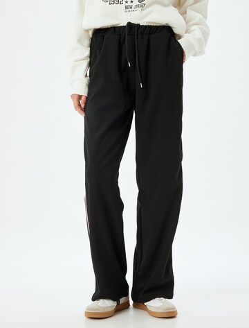Koton Wide leg Trousers in Black: front