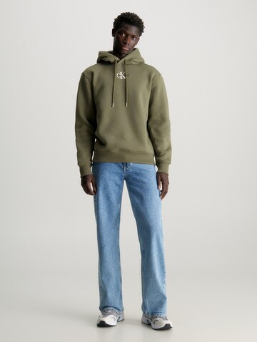 Calvin Klein JeansSweater majica - zelena boja
