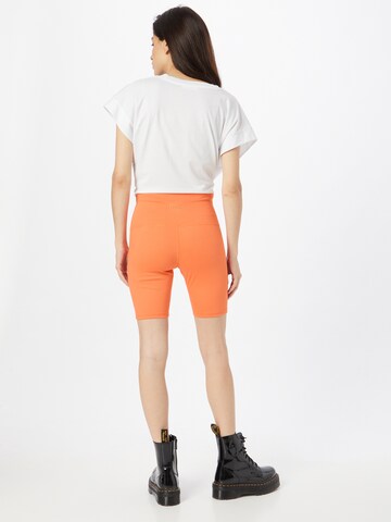 oranžs LEVI'S ® Piegulošs Legingi 'Youth Bike Short'