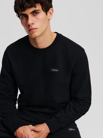 Karl LagerfeldSweater majica - crna boja