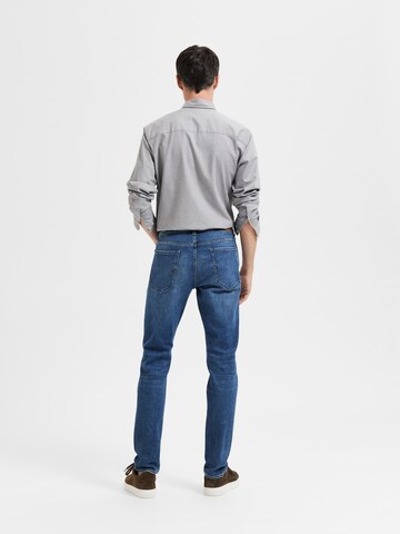 Coupe slim Jean 'Leon' SELECTED HOMME en bleu