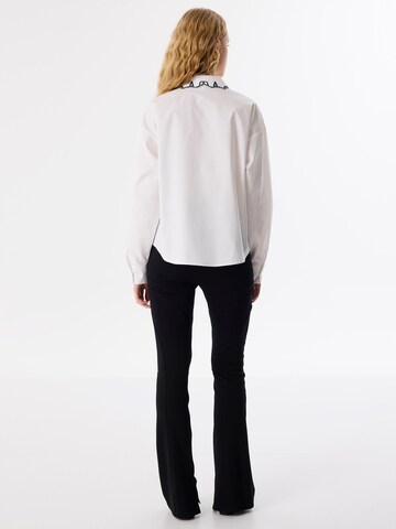 Twist Blouse ' Relaxed fit Contrast Embroidered ' in Beige
