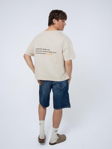 BAYSIDE BOUND Shirt 'THE SUNRISE UNISEX BOXY TEE'‌‌‌‌‌‌‌‌‌‌ in Beige