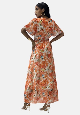 Elara Kjole i orange