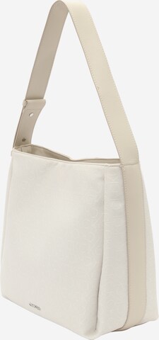 Calvin Klein Regular Olkalaukku värissä beige