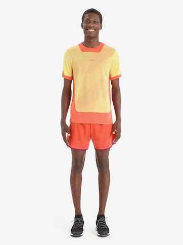 ICEBREAKER Toiminnallinen paita 'GEODETIC' värissä oranssi