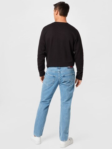 Tommy Jeans تابيرد جينز بلون أزرق
