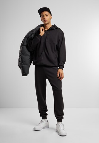 Urban Classics Sweatjacka i svart