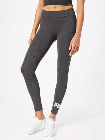 PUMA Skinny Sportbroek in Grijs: voorkant