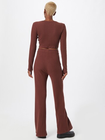 ABOUT YOU Flared Trousers 'Lucia' in Brown