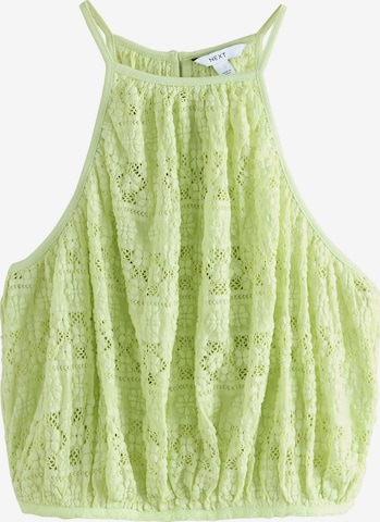 Top di Next in verde: frontale