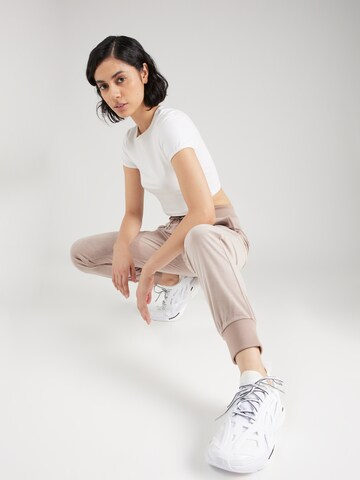 GUESS Tapered Sporthose in Beige