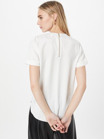 River Island - Blusa en blanco