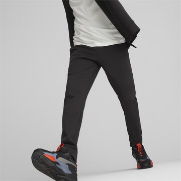 PUMA - Tapered Pantalón en negro