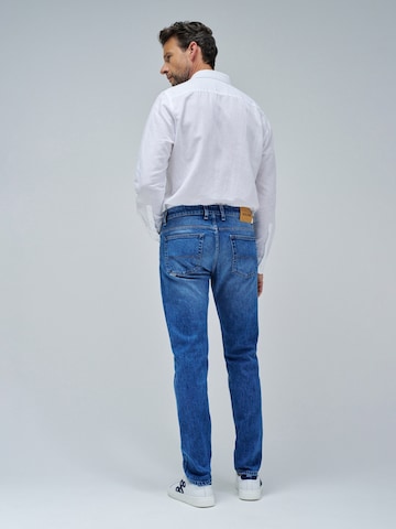 Coupe slim Jean Salsa Jeans en bleu