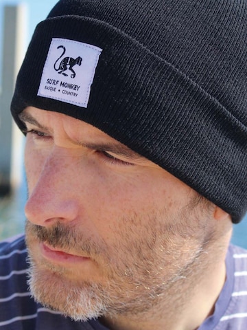 Surf Monkey - Gorra en negro: frente
