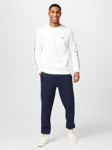 Sweat-shirt LACOSTE en blanc