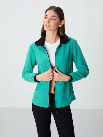 Giacca di pile di Tommy Life in verde