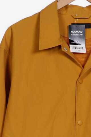 UNIQLO Jacket & Coat in L in Yellow