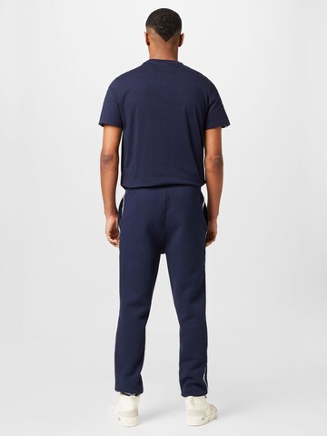 LACOSTE - Tapered Calças em azul