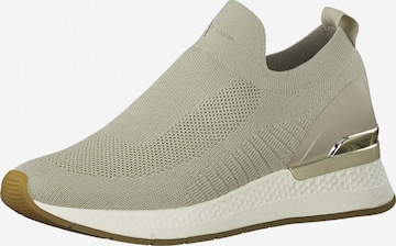 Slip on Tamaris Fashletics en beige : devant