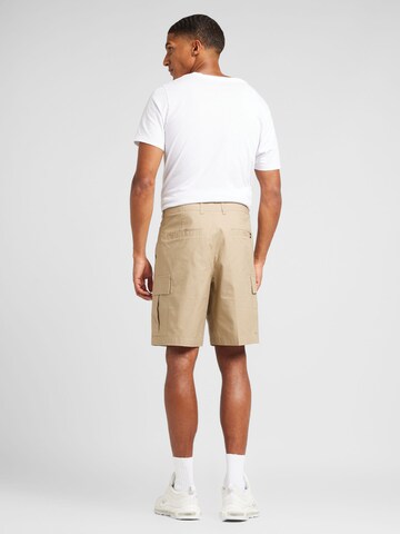 Regular Pantalon cargo 'CLUB' Nike Sportswear en vert