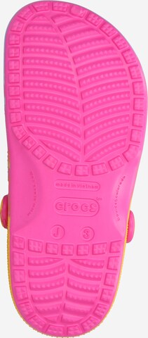 Chaussures ouvertes Crocs en rose