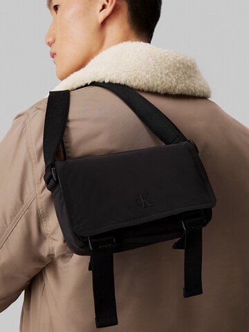 Calvin Klein Jeans Crossbody Bag in Black: front