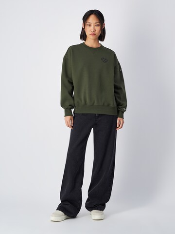 Champion Authentic Athletic Apparel Sweatshirt in Green