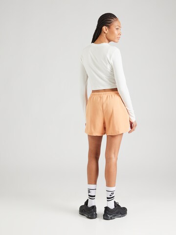 Nike Sportswear Regular Byxa i orange