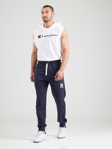 Champion Authentic Athletic Apparel - Tapered Pantalón en azul