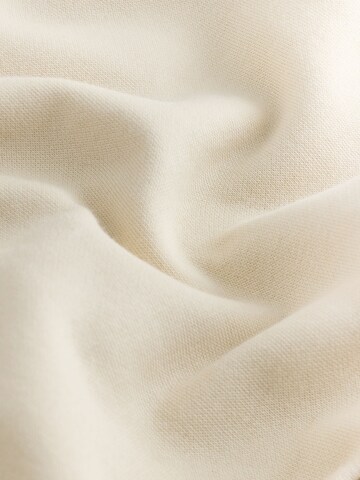 Bluză de molton de la Next pe bej