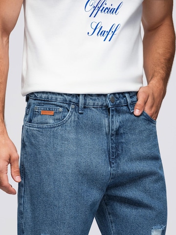 Ombre Tapered Jeans in Blue