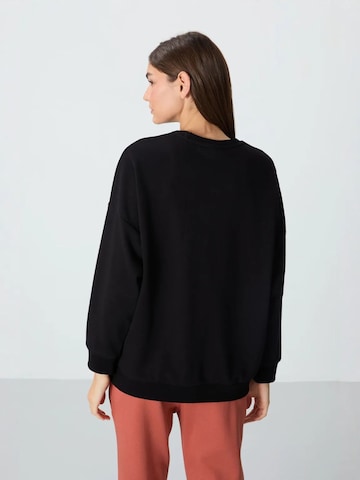 Tommy Life Sweatshirts in Schwarz